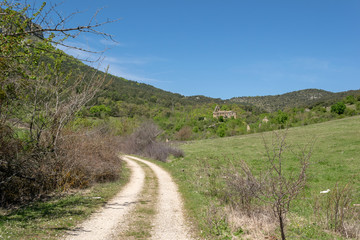 Fototapeta na wymiar Rural way. Ribera (Álava). Abandoned village in the natural park of Valderejo.
