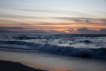 Fototapeta premium Sunset waves at Marina State Beach in Monterey County California 