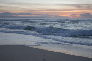 Sunset waves at Marina State Beach in Monterey County California 