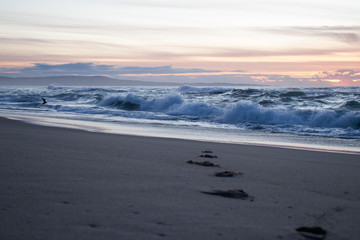 Sunset waves at Marina State Beach in Monterey County California 