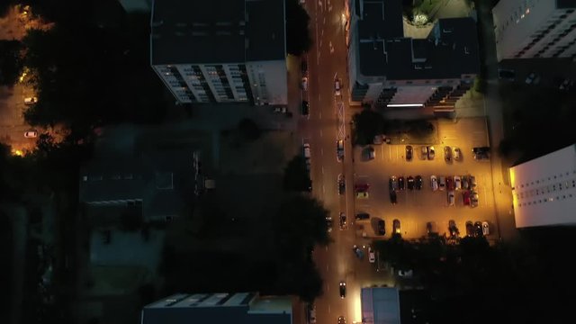 Aerial view of the night junction in the center of Warsaw. Poland. Drone view of an intersection with lots of traffic at night. 4K Shot