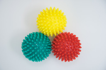 Massage balls. Three different colored balls on a white background.
