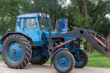 Fototapeta premium old tractor blue
