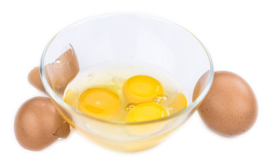 Some Raw Eggs isolated on white (selective focus).
