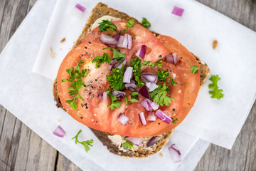 Some fresh Tomato Sandwich (selective focus; close-up shot)