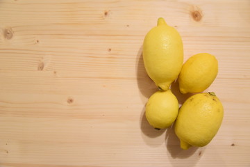 Fresh Lemons on Wooden Table