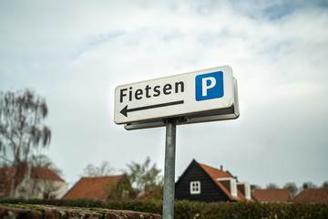 Obraz premium Picture of navigation signs for parking place for bycicles in the netherlands