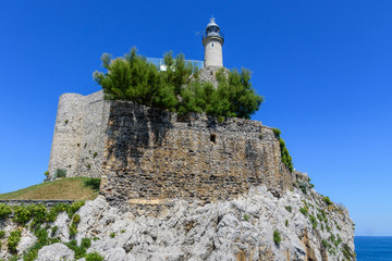 Fototapeta na wymiar lighthouse in the port of santander