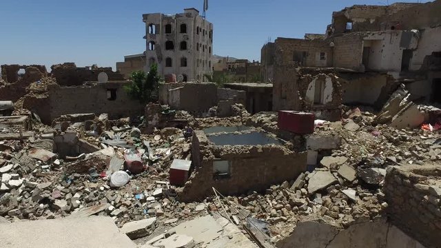 the ruins of houses that destroyed by fierce fighting between al-Houthi militia and the national army in Taiz City,Yemen