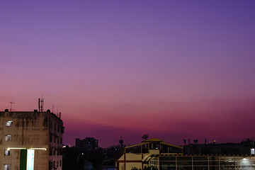 Fototapeta na wymiar Photos of city buildings at night with beautiful sunset lights.