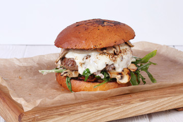 Grilled burger on a white background