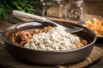 Barley groats with stewed meat.