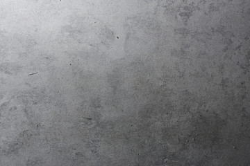 Shabby abstract gray metallic background. Aged grunge texture with scratches and damage