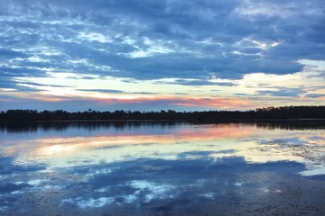 Stunning sunset reflection in lake 
