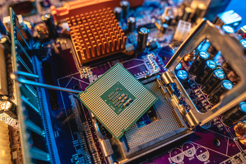 Modern processor CPU on the motherboard of the computer. Concept of technology hardware and repair...