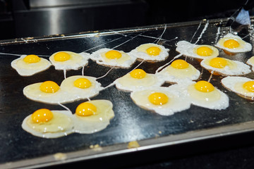 Fried and boiled eggs omelet breakfast in the kitchen