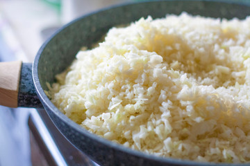 Finely chopped cabbage in a frying pan
