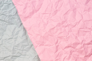 Fototapeta premium Pastel pink and light grey crumpled wrinkled paper texture background
