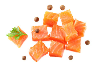 Red fish. Raw salmon fillet with parsley and peppercorns isolate on white background. Top view