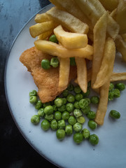 Fish and chips with green peas