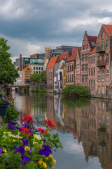 Fototapeta na wymiar Reflections in a channel in Gante city, Belgium