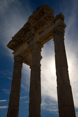 Fototapeta premium Silhouette of corinthian columns and lintel ruins of Trajan Temple at Pergamon Bergama Turkey