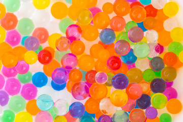 Fototapeta na wymiar Colorful growing water balls background