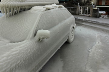 Car caught in the ice in Versoix Switzerland