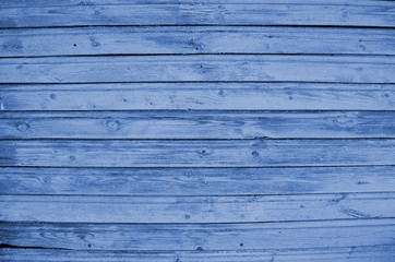 The blue wood texture with natural patterns. Classic Blue color. Color of the year 2020. Trendy color.