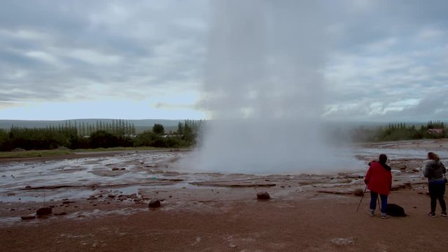 Geysir destrict in Iceland. The Strokkur Geyser erupting at the Haukadalur geothermal area, part of the golden circle route, in Iceland. Strokkur Geysir geyser on the south west Iceland. 4K