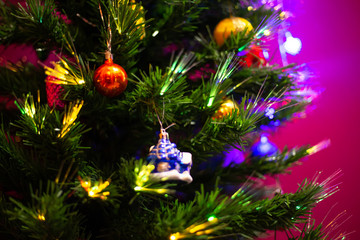 Christmas toys hanging on a Christmas tree