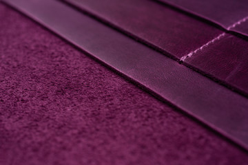 Purple handmade leather wallet details closeup