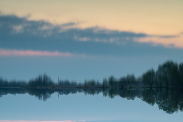 Fototapeta na wymiar Abstract inverted evening landscape.