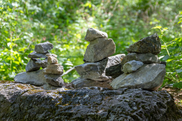 The heap of stones called CAIRN in the Ruskeala Park, Republic of Karelia, Russia. This stack indicates the right way