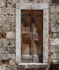 old door texture, door of architectural decoration of buildings, old doors  in Italy, public places - 311239120
