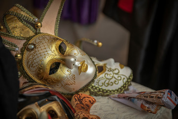 Venetian costume masks from a masquerade ball party. - 311239139