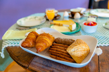 Breakfast served with coffee, orange juice, croissants, cheese and fruits. Balanced diet. - 311239947