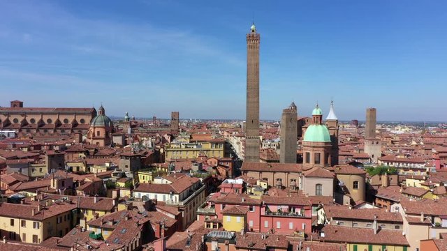 Two towers Bologna Italy aerial cityscape panning.