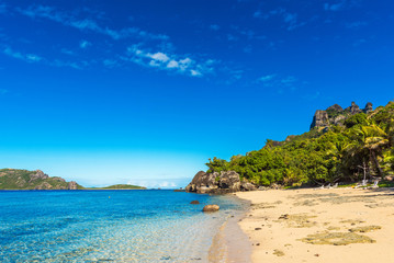 View of the sandy beach of the island, Fiji. Copy space for text.