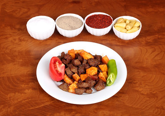 a Feed lamb liver with potatoes and tomatoes arnavut cigeri for Hotel & Restaurant Orders and Menu and Internet and TV