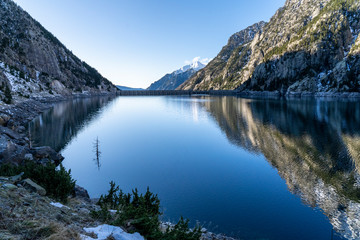 Naklejka na ściany i meble Cavallers reservoir in National Park of Aigüestortes and lake of Sant Maurici.