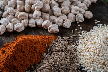 chickpeas hummus Ingredients and smoked paprika and caraway and sesame seeds