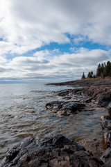Fototapeta na wymiar Rocky Shoreline with Lake Superior