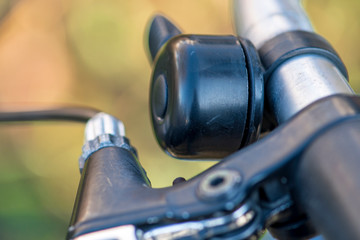 Bicycle bell with brake on bicycle handlebar