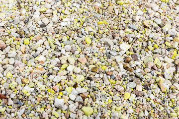 Green yellow suphur rocks from a ghost town