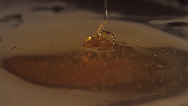 pouring sweet honey slow motion