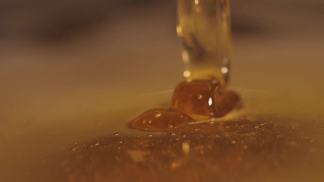 pouring sweet honey slow motion