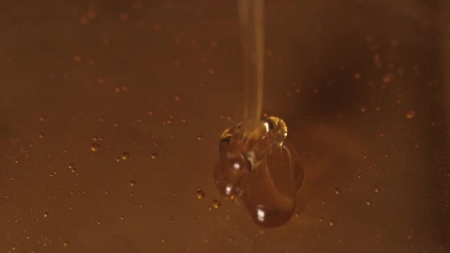 pouring sweet honey slow motion