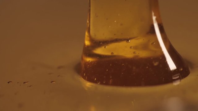 pouring sweet honey slow motion