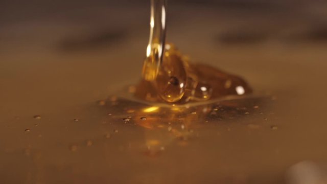 pouring sweet honey slow motion